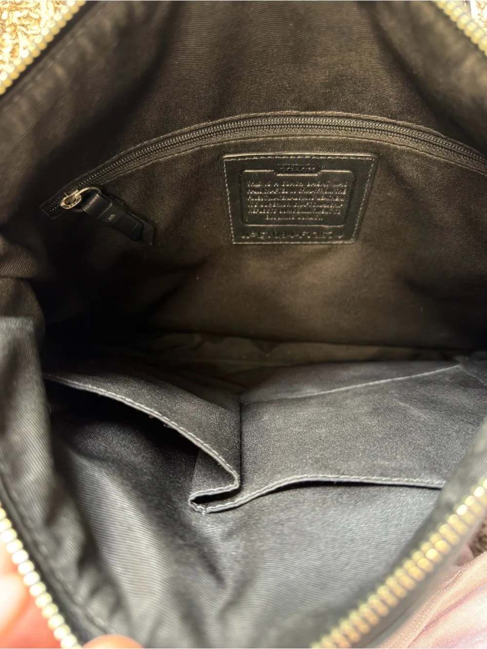 Coach iconic signature